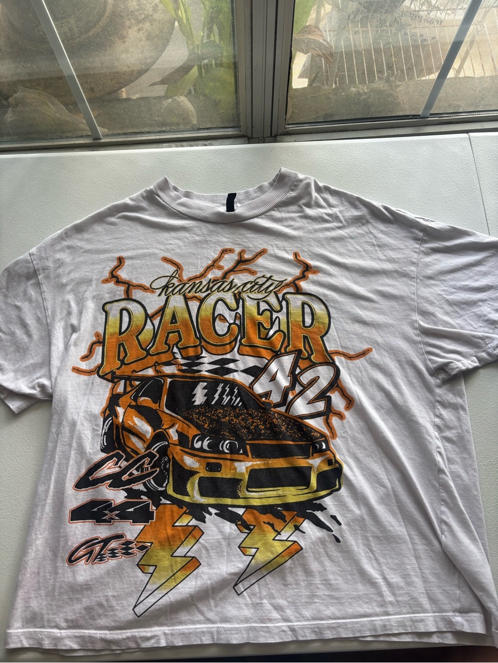 H&M White Racer 42 Graphic Tee with Orange and Yellow Accents